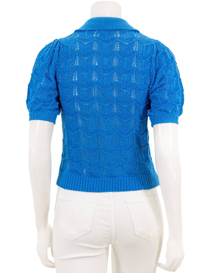 Back view of Vox Lux's Crocheted Polo Sweater in Turquoise.