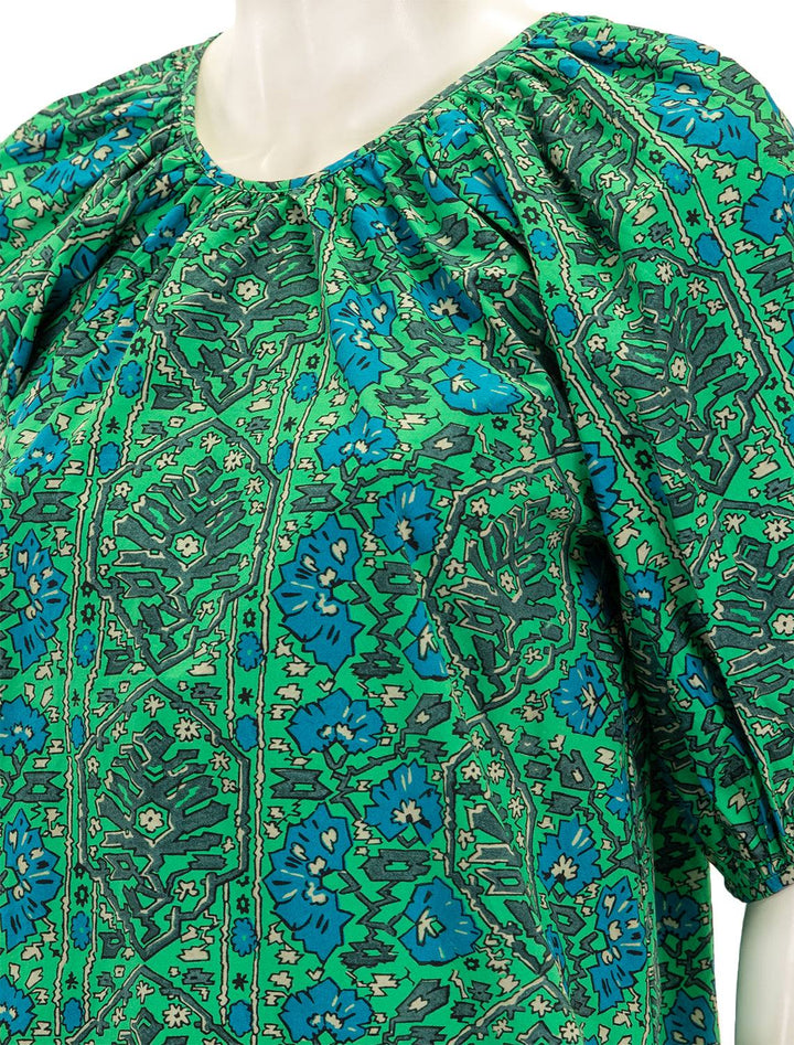 Close-up view of Rhode's rowan top in ivy flora.