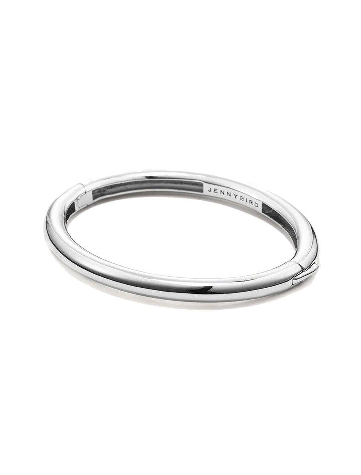 Front angle view of Jenny Bird's Gia Bangle in Silver Dipped Brass.