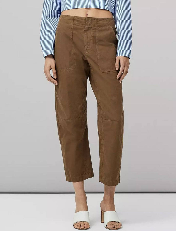 Model wearing Rag & Bone's leighton workwear pant in olive.