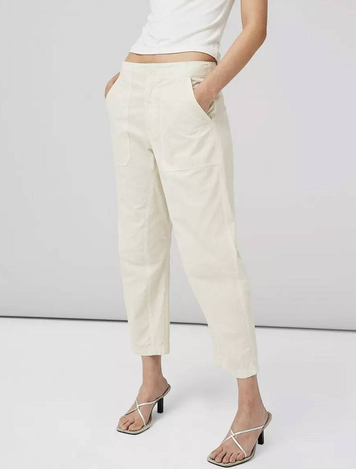 Model wearing Rag & Bone's leyton workwear pant in ivory.