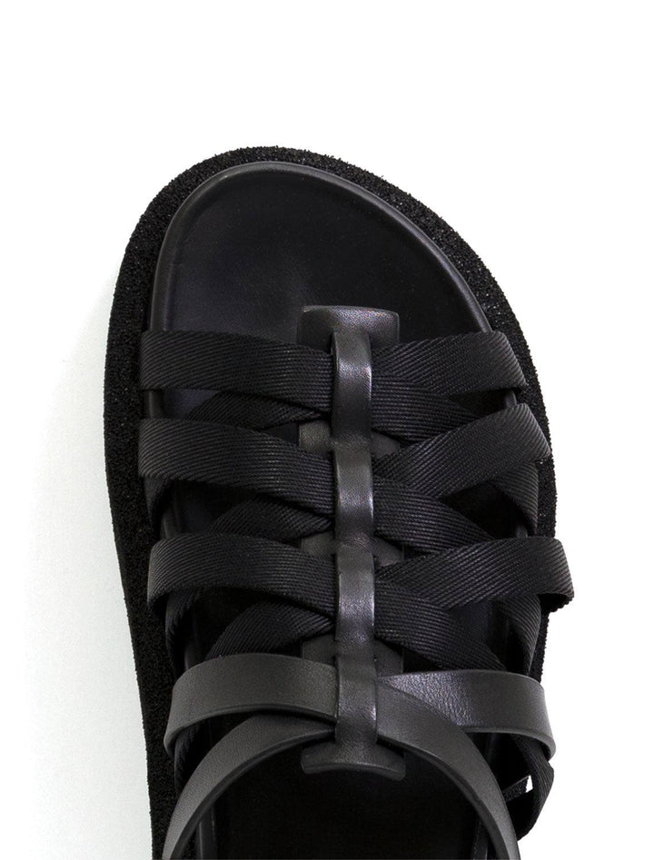 Close-up view of Rag & Bone's park sandal in black.