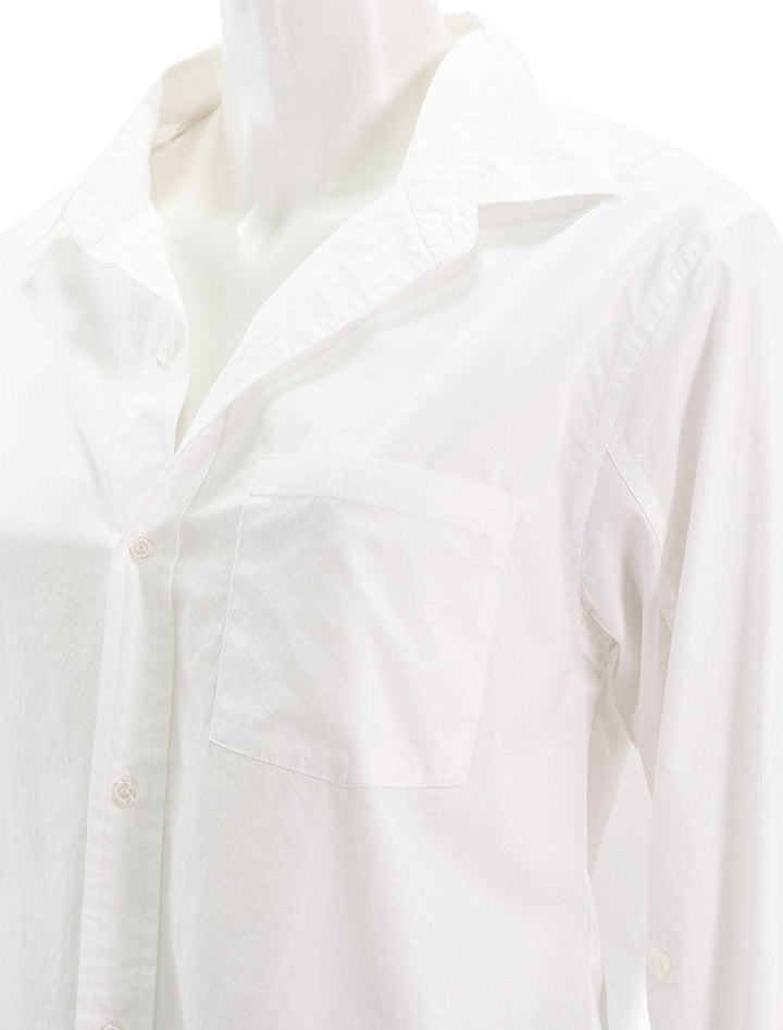 close up view of kayla shrunken shirt in optic white front pocket 