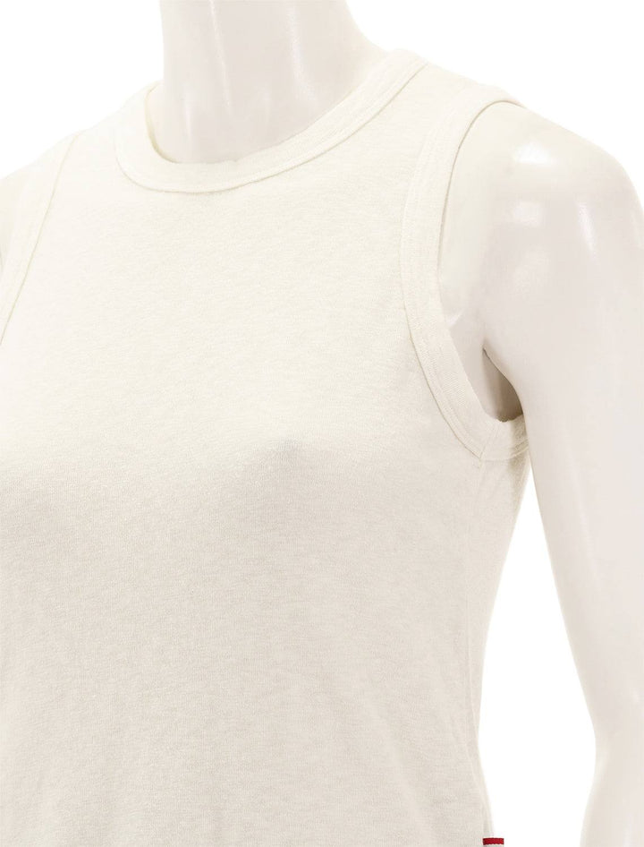 Close-up view of Sol Angeles' eco slub tank in dirty white.