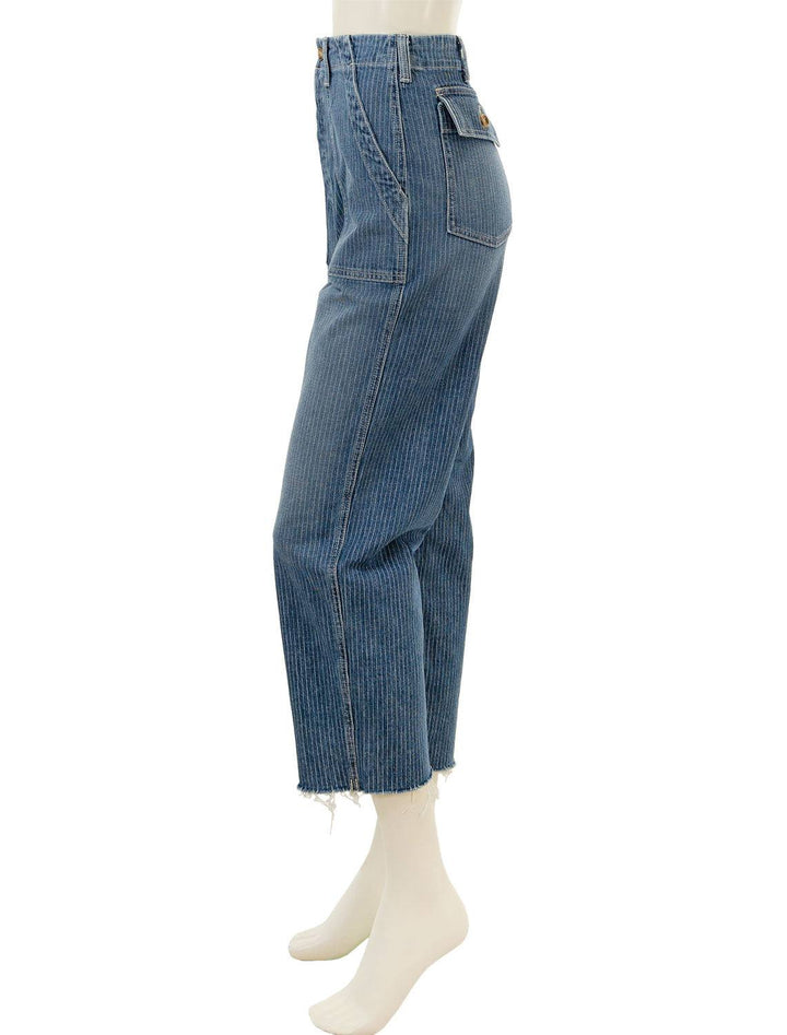 Side view of Mother Denim's patch pocket ankle fray in on the right track.