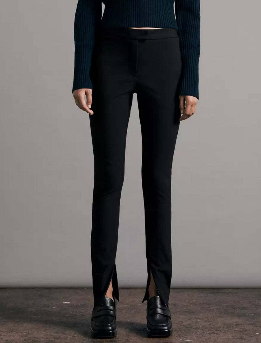 Model wearing Rag & Bone's rebecca pant in black.