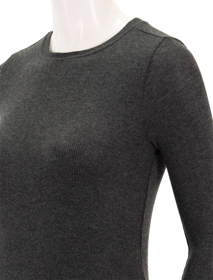 Close-up view of Goldie Lewinter's ribbed long sleeve tee in charcoal heather.