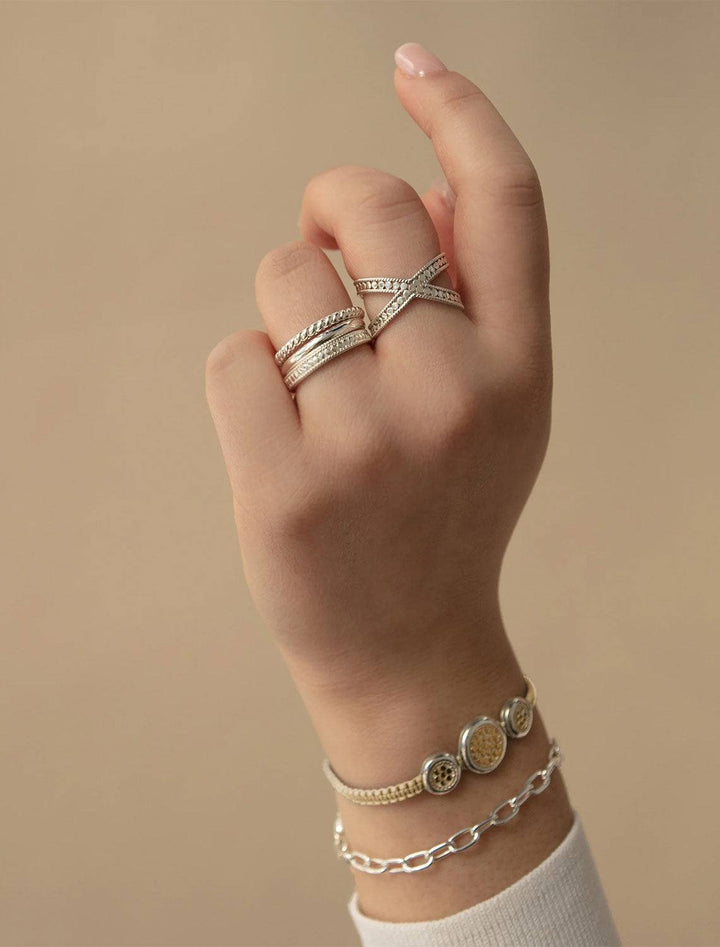 Model wearing Anna Beck's classic triple stacking ring.