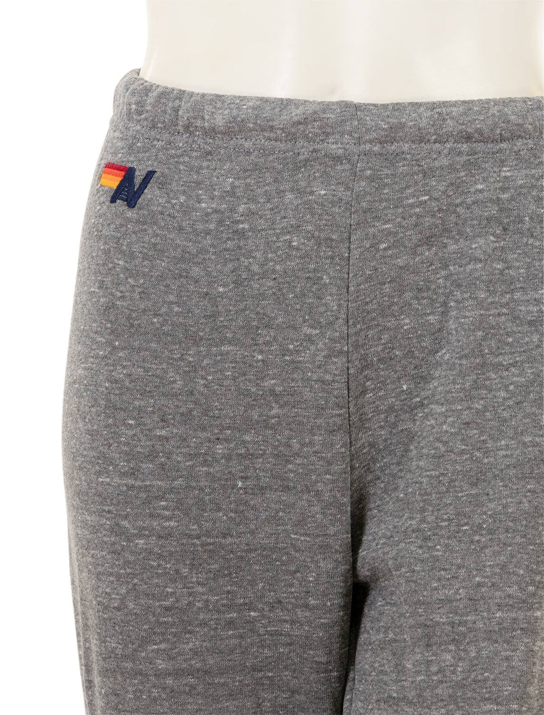 Close-up view of Aviator Nation's 5 stripe womens sweatpants in heather grey.