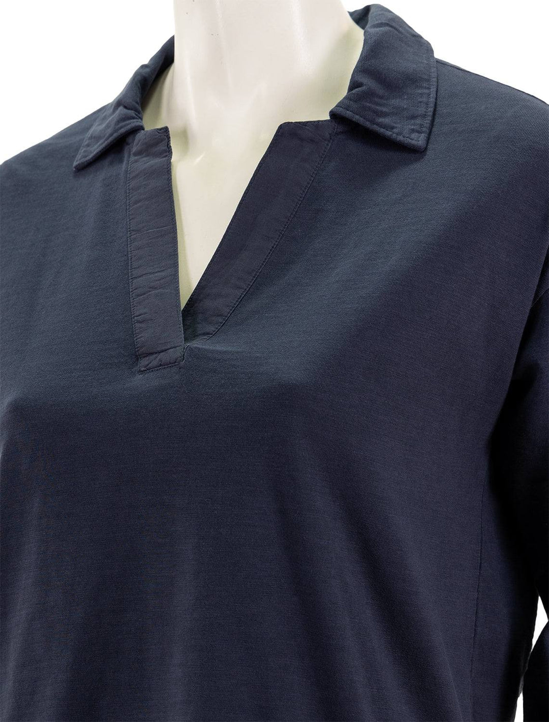 Close-up view of Faherty's sunwashed polo in navy.
