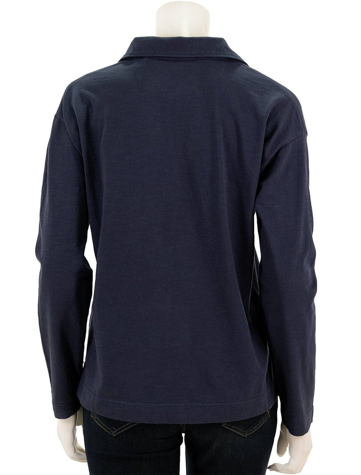Back view of Faherty's sunwashed polo in navy.