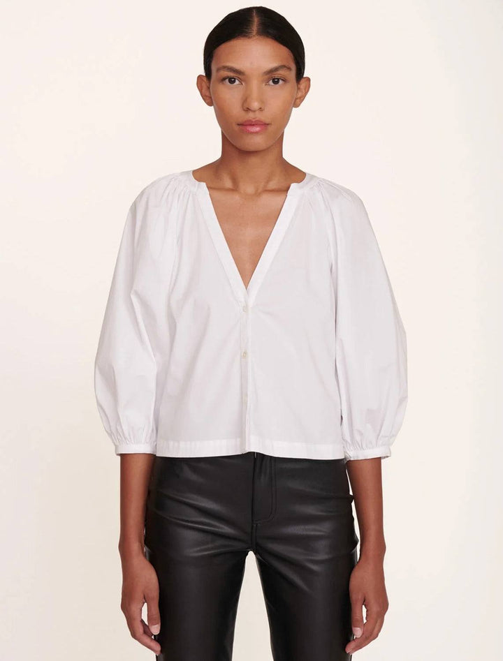 Model wearing STAUD's new dill top in white.