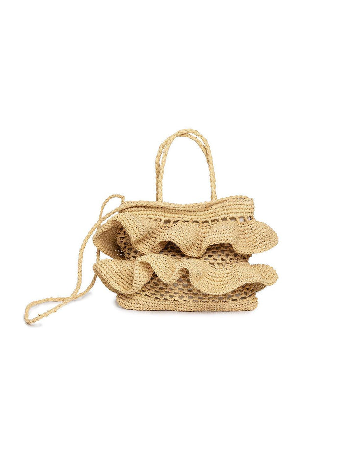 Front view of Hat Attack's gypsy bag in natural, with strap showing.