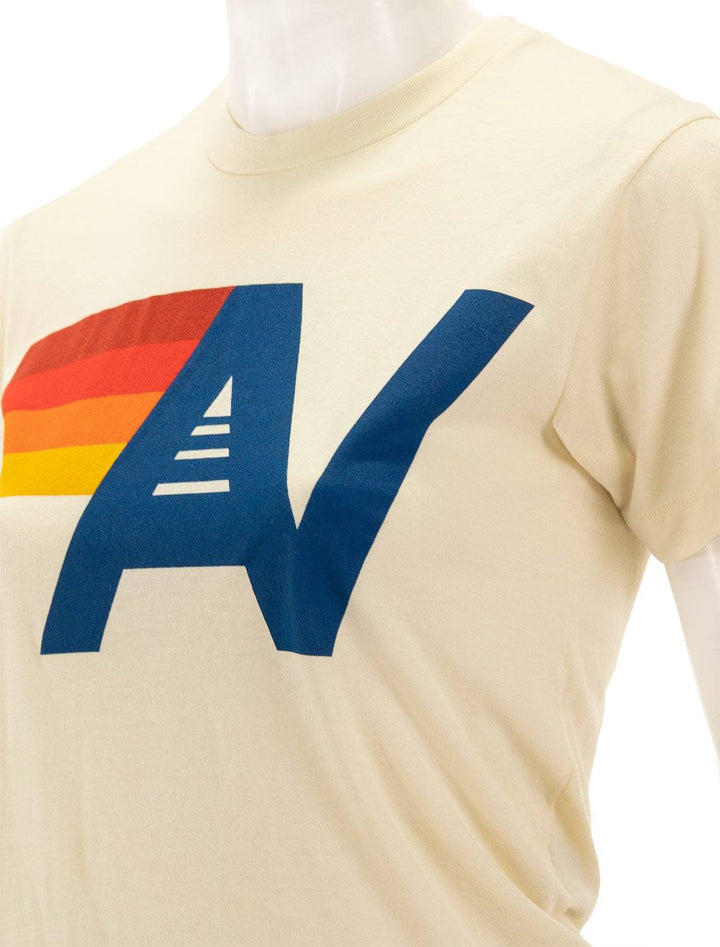 Close-up view of Aviator Nation's logo crew tee shirt in vintage white.