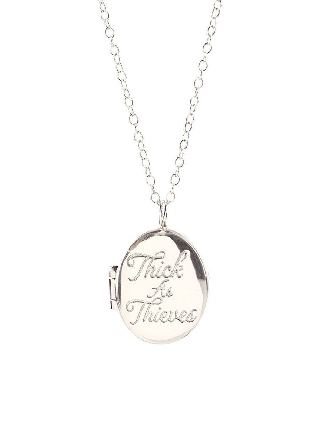 thick as thieves locket in silver